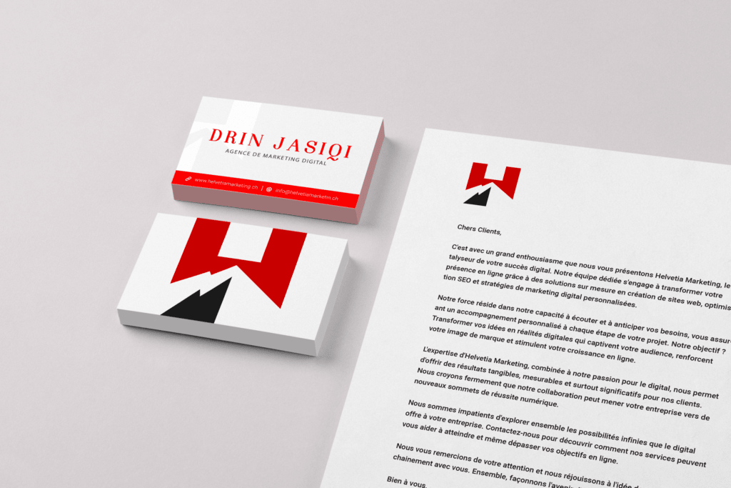 Éléments de communication visuelle d'Helvetia Marketing, incluant une carte de visite et un papier à en-tête, présentant le logo distinctif de l'agence de marketing digital et ses informations de contact, conçus pour renforcer l'image de marque et la présence en ligne.